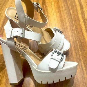 White platform heels